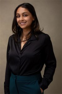 A photo of a woman wearing a black shirt